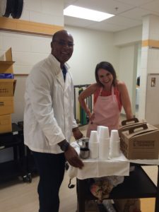 principal brown and AP delivering coffee